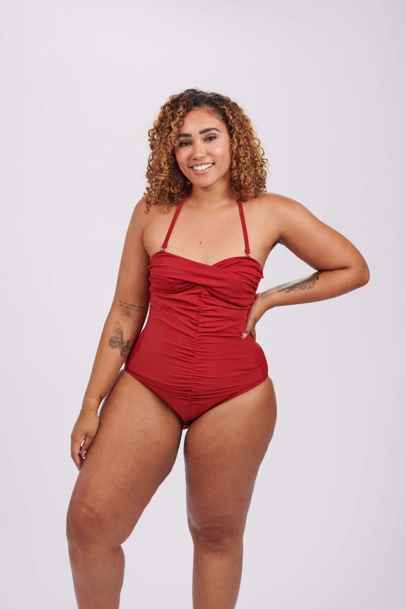 Alicia Ostomy Swimsuit - Elevate your swimwear game with our Alicia Ostomy Swimsuit! This versatile piece features a removable strap, double-lined front, and a full-width inner pouch for ultimate comfort and confidence. Choose from red, black, or navy to