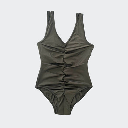 Jessica Womens Ostomy Swimsuit - Introducing Jessica Swimwear, a stylish and functional choice for ostomy women seeking comfort and confidence at the beach. This swimsuit features a flattering V-Neck cut, accentuated by a lightly gathered front for a touc
