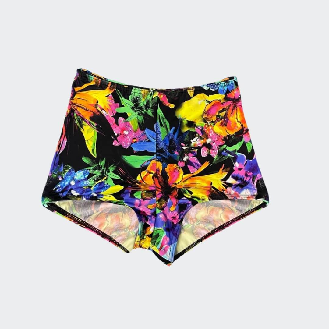 Sarah Midi Womens Ostomy Shorts - The Sarah Midi Short swimwear offers comfort and style for the modern woman. Designed specifically for ostomy wearers, this tankini bottom provides full coverage and a double lined front panel for added confidence. The fu